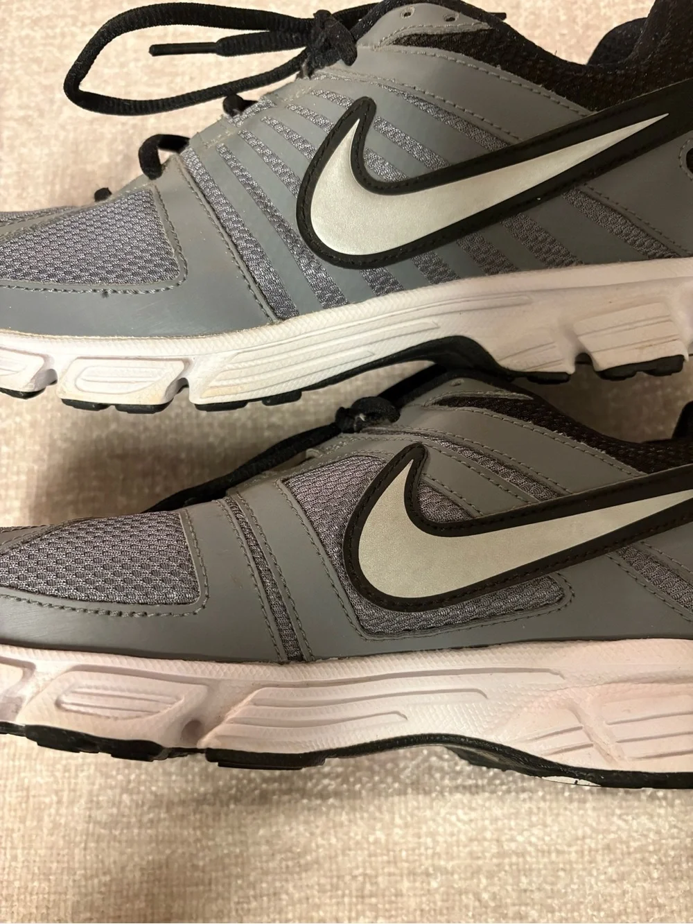 Nike Men’s Gray and Black DownShifter 5 Running Shoes with Orange Logo Size 9.5